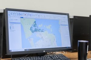 A computer screening showing geographic data analysis in ArcGIS software.