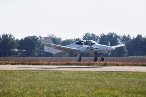 Delta State University aviation program aircraft approaching the runway as part of flight training operations.