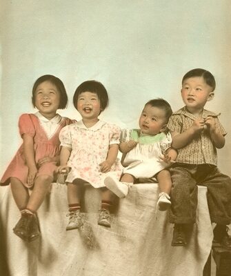 Color, three children and infant pose for photograph, Color.
