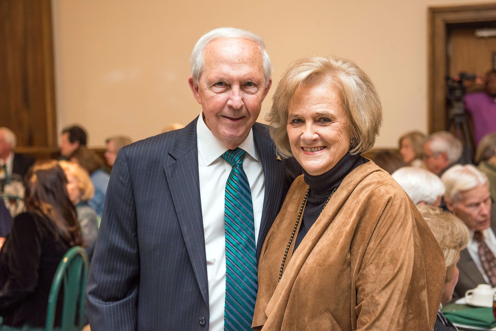 older couple at a banquet