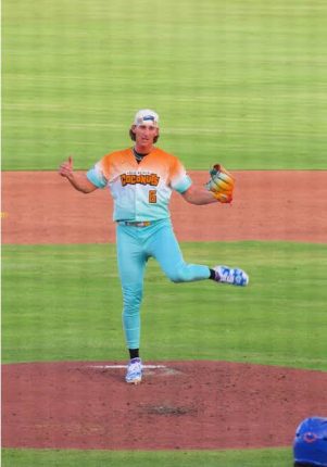 a baseball pitcher dancing on the mound